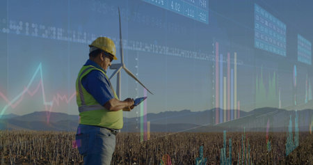 Tech wearing safety vest analyzing tablet overlay data in field, with wind turbine, copy space....