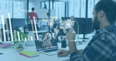 Holding mug bearded man in checkered shirt viewing call on laptop at open-plan office, copy space....