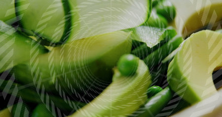 Displaying spiral vegetable ribbons curling on cutting board, with green peas and graphic overlay. Fresh produce, culinary art, minimalist design, healthy living, food presentation, vibrant colors, organic foodの写真素材