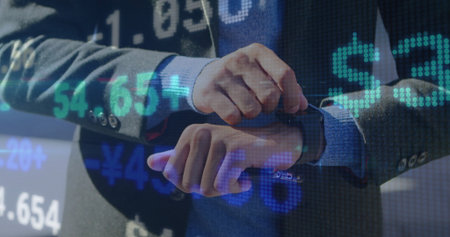 Adjusting executive smartwatch on wrist at trading desk, with jacket cuff and financial overlay. Technology, finance, business, professionalism, data visualization, digital, corporateの写真素材