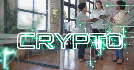 Discussing women in suits analyzing clipboard and tablet in coworking office with crypto overlay. Collaboration, teamwork, innovation, modernity, professionalism, digital, networkingの写真素材