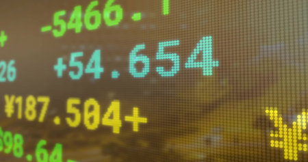 Displaying LED ticker showing market figures at harbor, with yen symbol, plus minus signs. Technology, finance, data visualization, digital signage, urban, modern, financial marketの写真素材