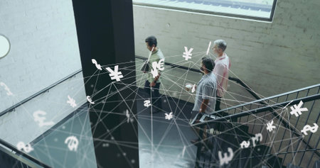 Descending team holding smartphone, tablet, laptop on office railing with floating currency symbols. Professional, teamwork, modern, industrial, finance, technology, collaborationの写真素材