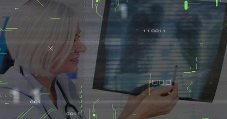 Inspecting doctor holding X-ray film in radiology lab, with digital overlay and stethoscope....