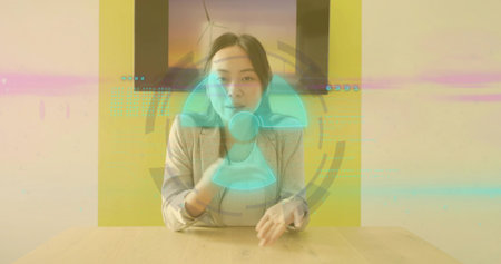 Presenting woman in blazer gesturing at holographic display explaining wind turbine in meeting room....