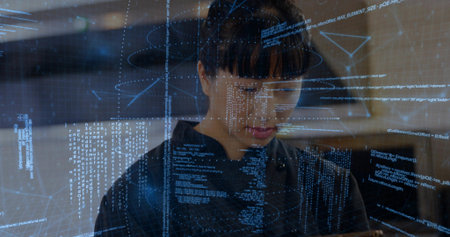 Mid adult Asian engineer analyzing code on holographic interface in tech lab, with handheld tablet. Futuristic, innovation, digital, cybersecurity, high-tech, professional, sleekの写真素材