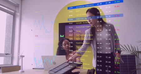 Business professionals discussing renewable energy in office, with solar panel sample, wind turbine. Innovative, collaboration, sustainability, technology, corporate, modern, eco-friendlyの写真素材