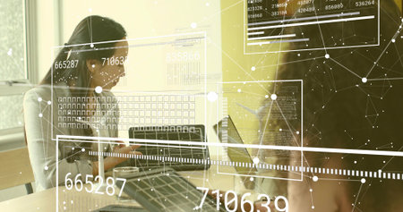 Analyzing data overlays Asian data analyst at conference table in office using laptop, copy space. Technology, analytics, innovation, collaboration, modernity, data visualization, professionalの写真素材