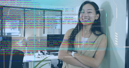 Leaning Chinese tech professional crossing arms at office wall, showing code overlays, copy space. Futuristic, innovation, modern, collaborative, digital, sleek, workspaceの写真素材