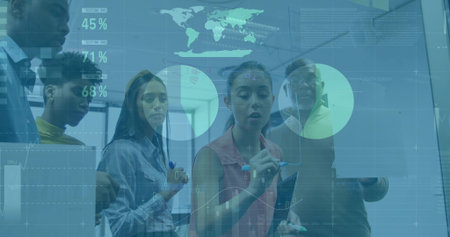 Five professionals analyzing charts and world map on office touchscreen, with tablets stylus pens. Collaboration, data visualization, teamwork, innovation, digital tools, business strategyの写真素材