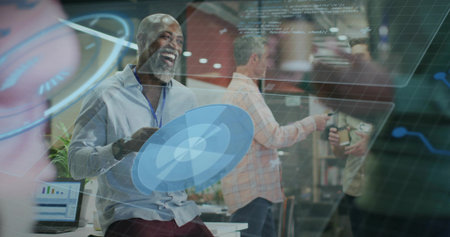 Holding shield, man in blue shirt leaning on desk at office, with floating data overlays. Technology, collaboration, innovation, futuristic, workspace, digital, professionalismの写真素材