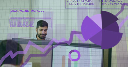 Analyzing data on dual monitors, data analyst working at office cubicle with purple overlays. Technology, workspace, innovation, digital, professional, productivity, modernの写真素材