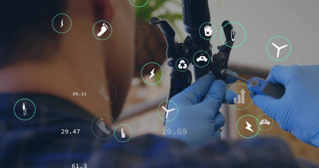 Mechanic wearing blue gloves tightening brake cable on handlebar at workshop bench, with IoT icons. Industrial, craftsmanship, technology, sustainability, innovation, repair, maintenanceの写真素材