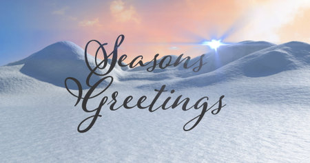 Image of seasons greetings text over winter scenery. Christmas and digital interface concept digitally generated image.の写真素材