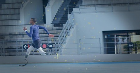 Sprinting teenage athlete with prosthetic blades and sports watch on stadium track lane, copy space. Athlete, sports, racing, endurance, competition, performance, outdoorの写真素材