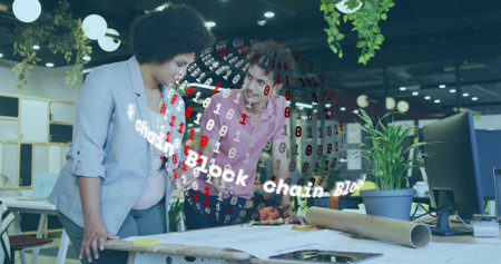 Reviewing colleagues examining plans and interacting with blockchain hologram in open-plan office. Collaboration, teamwork, innovation, technology, modern, professional, planningの写真素材