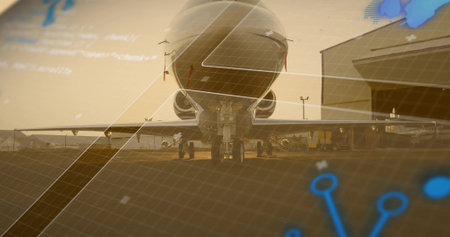 Presenting commercial jet sitting head-on on tarmac at golden hour, with hangar, map interface. Aviation, technology, transportation, industry, infrastructure, dashboard, dataの写真素材
