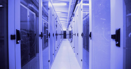 Featuring tiled aisle running along data center corridor, with server racks and cable trays....