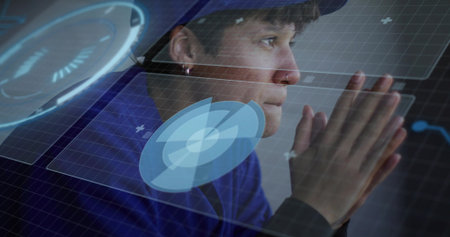 Sitting woman interacting with holographic panels at workstation, with circular charts. Futuristic,...