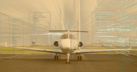Displaying white business jet sitting on airport tarmac, runway markings, grass, code overlay....
