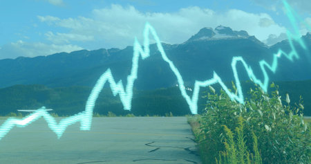 Displaying cyan line graph overlay across runway, with yellow wildflowers and snowcapped peaks. Mountain, landscape, aviation, technology, wilderness, adventure, terrainの写真素材