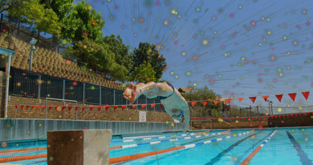 Diving male athlete wearing swim briefs plunging off block at outdoor pool with digital overlay....