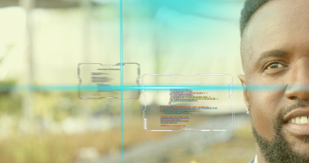 Mid adult man touching holographic code panels on garden path, with blue crosshairs, copy space. Futuristic, technology, innovation, outdoor, professional, digital, interfaceの写真素材