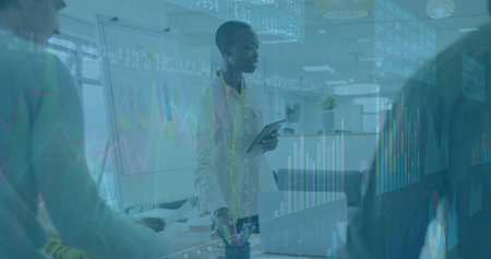 Presenting Black woman with tape measure holding tablet at office, with whiteboard and data charts....