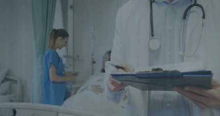 Doctor in coat and stethoscope holding clipboard taking notes in hospital with IV pole, copy space. Medical staff, healthcare, clinical, diagnostic, professionalism, patient care, hospital environmentの写真素材