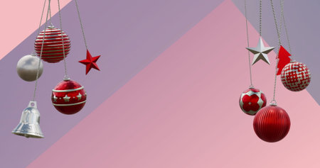 Image of christmas baubles decorations over pattern on purple background. Christmas, festivity, celebration and tradition concept digitally generated image.の写真素材