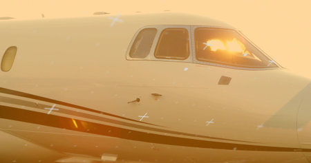 Showing jet fuselage and cockpit windows reflecting golden-hour light on tarmac, with sensors. Luxury, aviation, sleek, modern, travel, scale, engineeringの写真素材