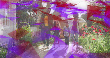 Walking family of four carrying backpacks, tote bag on brick garden path, with red poppy flowers. Family, outdoor, spring, leisure, nature, landscaping, casualの写真素材