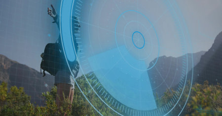 Stretching arms female hiker viewing mountain view on slope, backpack, blue HUD overlay, copy space. Adventure, exploration, outdoor, wilderness, rugged, panoramic, trailの写真素材