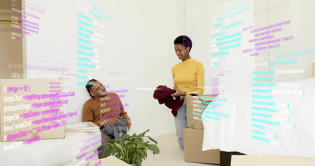 Unpacking couple sorting clothes in residential bedroom, with moving boxes and projected code. Minimalist, vibrant, cozy, technology, home, organization, relationshipの写真素材