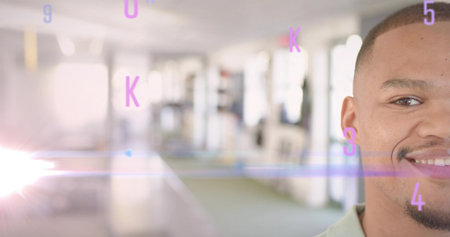 Smiling man wearing collared shirt in office corridor with overlays, lens flare, copy space....