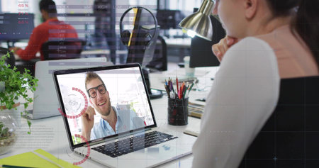 Joining remote meeting woman wearing white top sitting at office desk, with laptop, copy space....