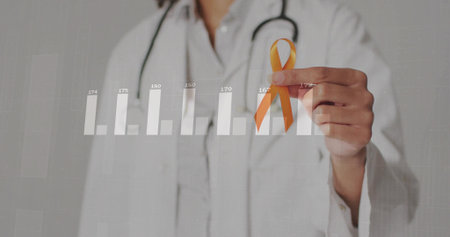 Displaying Hispanic doctor holding orange ribbon in clinic, with stethoscope and bar chart overlay....