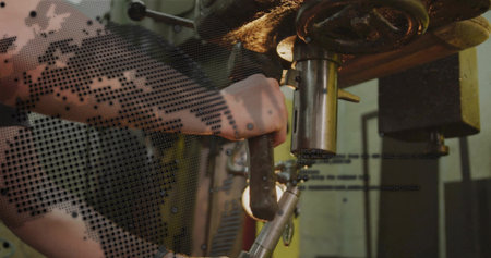 Operating technician gripping lever at workshop, with drill press, metal workpiece and code overlay. Industrial, machinery, manufacturing, precision, technology, engineering, workshopの写真素材