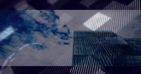 Reflecting glass skyscraper capturing cloudy sky and light reflections in urban center, copy space. Architectural, urban, contemporary, minimalist, reflective, structural, professionalの写真素材