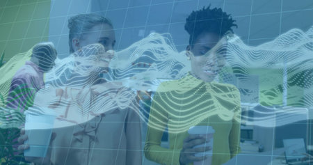 Standing two coworkers holding coffee cups in modern open-plan office, with digital wave overlay. Collaboration, teamwork, communication, innovation, contemporary, productivity, professionalの写真素材