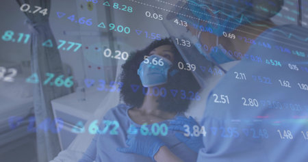 Masked patient on bed receiving injection from masked nurse in scrubs and gloves, data overlay. Healthcare, telemedicine, professionalism, safety, innovation, clinical, diagnosticの写真素材