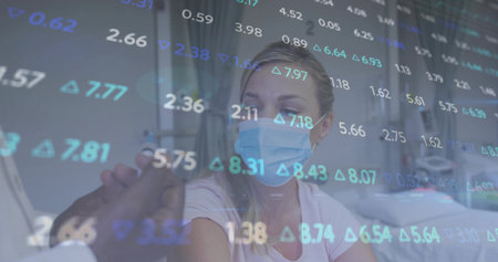 Sitting patient wearing mask getting vaccine shot in clinic, with syringe, gloves and data overlay. Medical, wellness, health, clinical, safety, modern, technologyの写真素材