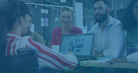 Business casual team analyzing financial charts in conference room, with laptop, coffee. Collaboration, analytics, teamwork, strategy, professionalism, data visualization, modernityの写真素材