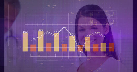 Professional wearing white blouse analyzing chart in office, with bars and white line graph and numbers. Financial, analytics, data, corporate, business, presentation, technologyの写真素材