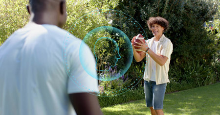 Playing friends tossing football in sunny backyard, denim shorts, holographic overlay, copy space....