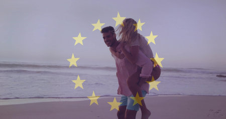Walking couple piggybacking on sandy beach, with yellow star overlay and ocean waves on horizon....