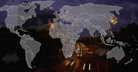 Showing world map overlay on dark highway, with glowing lamps, hexagons and blurred light trails. Global connectivity, transportation, urban infrastructure, data visualization, futuristic, technologyの写真素材