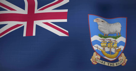 Flying Falkland Islands flag against dark blue field, featuring Union Jack and coat of arms. Heritage, symbolism, emblem, patriotism, heraldry, maritime, nauticalの写真素材
