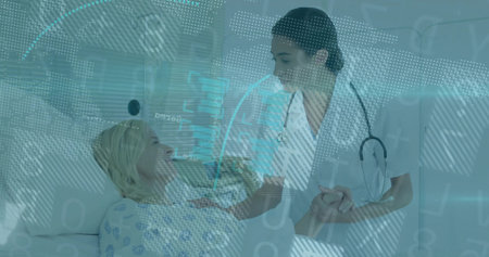 Caring medical caregiver holding patient hand at hospital bed, with digital globe data overlay....