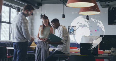 Collaborating colleagues reviewing documents around high table in open office, with green folder. Collaboration, teamwork, innovation, modern, workspace, productivity, brainstormingの写真素材